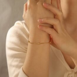 Hamsa and snake pattern bracelet